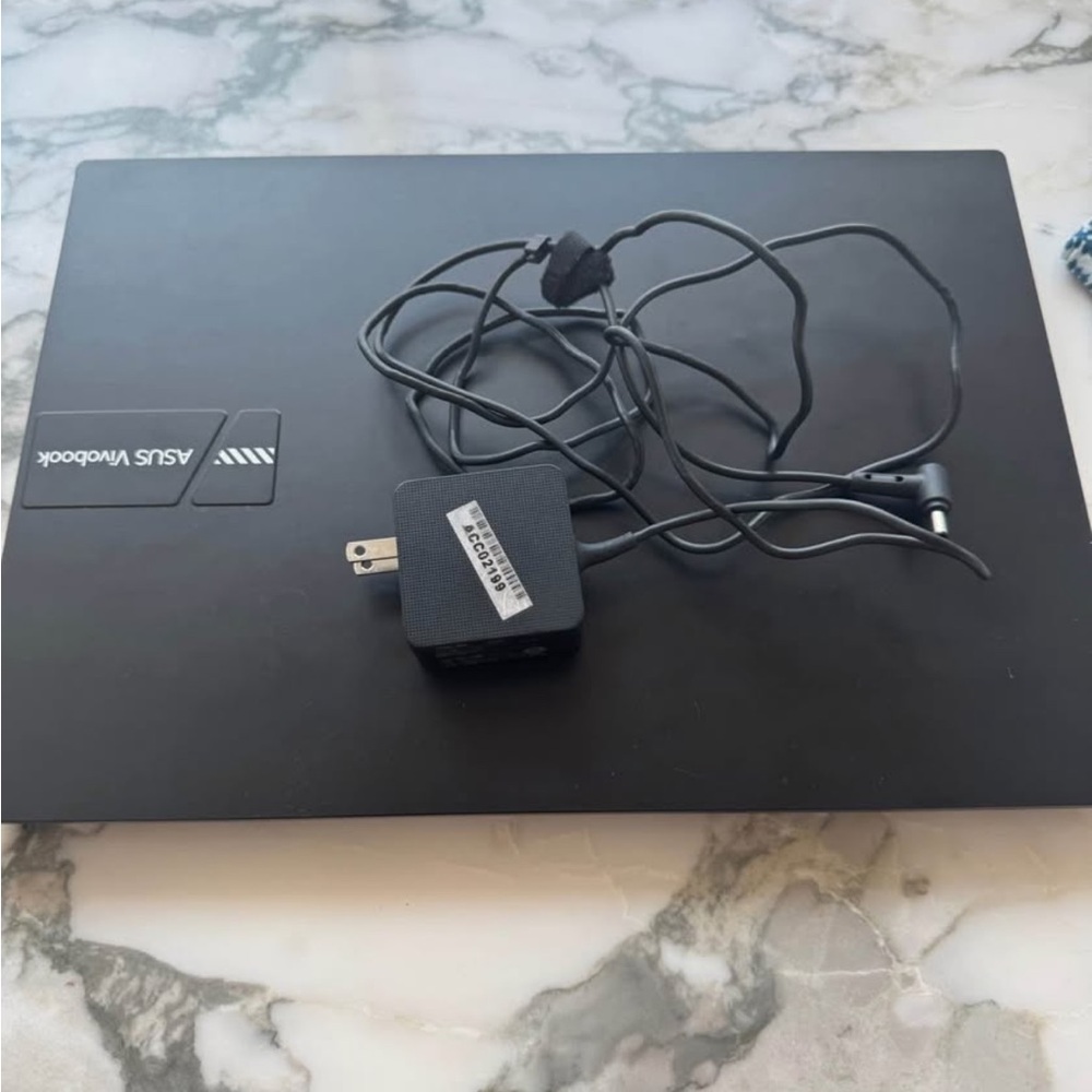 ASUS Black Laptop with Matching Black Power Adapter